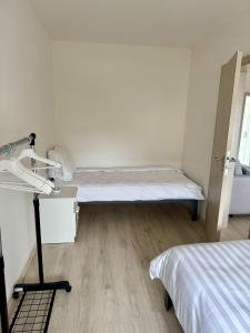 Postel nebo postele na pokoji v ubytování Apartmány Wolkenstein