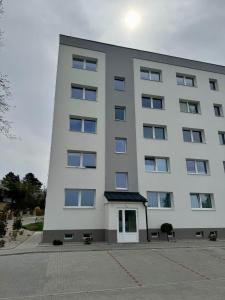 Budova, kde se apartmán nachází + 13 fotografií
