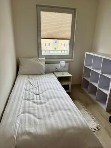 Postel nebo postele na pokoji v ubytování Apartmány Wolkenstein