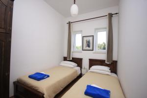 Postel nebo postele na pokoji v ubytování Villa Korčula + 34 fotografií