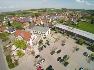 an aerial view of a small town with a parking lot at EuroHotel Günzburg in Günzburg
