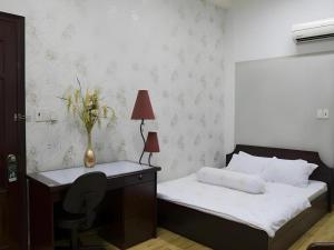 Кровать или кровати в номере Spring Hotel