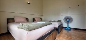 Postel nebo postele na pokoji v ubytování P.L.P Guesthouse - Mae Hong Son + 36 fotografií