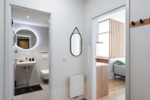 Koupelna v ubytování Olive Garden Apartment with Garage + 23 fotografií