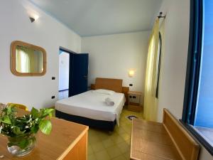 Letto o letti in una camera di Hotel Aura
