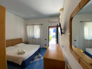 Letto o letti in una camera di Hotel Aura