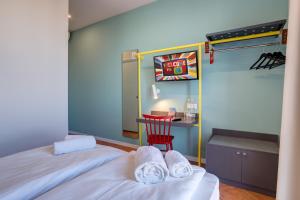 A bed or beds in a room at MEININGER Milano Garibaldi