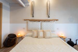 Postel nebo postele na pokoji v ubytování Is Perdas Rural Retreat & Spa