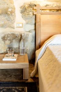 Postel nebo postele na pokoji v ubytování Is Perdas Rural Retreat & Spa