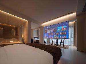 TV a/nebo společenská místnost v ubytování Qi Yi Nanxu Pavilion Homestay