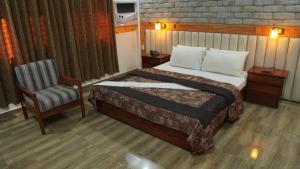 Park Hotel Gilgit客房内的一张或多张床位