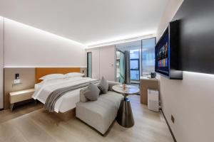 Voodi või voodid majutusasutuse 云之漾广州北京路长堤大马路店 toas