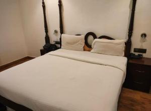 Ένα ή περισσότερα κρεβάτια σε δωμάτιο στο Bagah Beach Hotel +5 φωτογραφίες