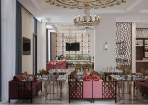 Televisyen dan/atau pusat hiburan di Surxondaryo Hotel Tashkent
