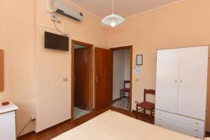 TV a/nebo společenská místnost v ubytování Hotel Costa d'Oro