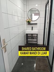 Vannituba majutusasutuses Hotel Pandu Lakeside Tuktuk