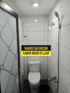 Vannituba majutusasutuses Hotel Pandu Lakeside Tuktuk