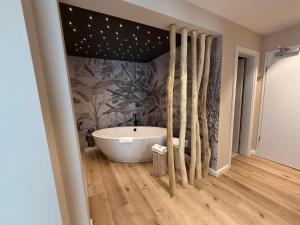 Koupelna v ubytování Das Oswald's Boutique Hotel