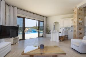 Kuchyň nebo kuchyňský kout v ubytování Paralia Beachfront Residence