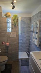 Koupelna v ubytování Maison Entre lac et océan