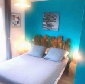 Postel nebo postele na pokoji v ubytování Maison Entre lac et océan