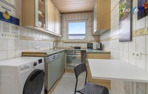 Kuchyň nebo kuchyňský kout v ubytování BEGE APARTMENTS FlexiStay