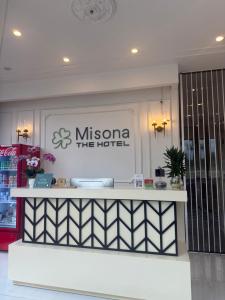 a minsonia the hotel reception desk in a building at Misona The Hotel in Long Thành
