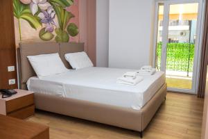 Letto o letti in una camera di Solis Giselle Hotel