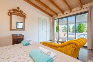 a bedroom with a bed and a large window at Banc Doli in Manacor +40 photos