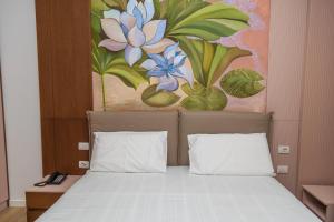 Letto o letti in una camera di Solis Giselle Hotel