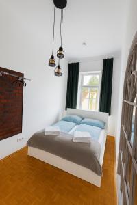 Łóżko lub łóżka w pokoju w obiekcie Urban by BestChoice - FREE Parking - Self Check-in