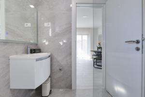 Koupelna v ubytování Penthouse Apartments Dora Kukljica