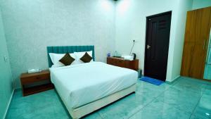 Periyar Vibes Private Pool Villa客房内的一张或多张床位
