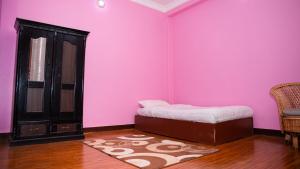 Voodi või voodid majutusasutuse YogStay Homestay in Kathmandu toas