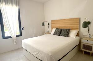 Ένα ή περισσότερα κρεβάτια σε δωμάτιο στο Resort Macenas # Sea Views # 2BR # WIFI # Family +16 φωτογραφίες