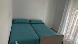 Postel nebo postele na pokoji v ubytování B&b al borgo + 1 fotografie