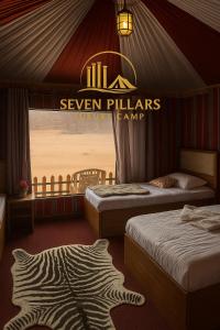 Postel nebo postele na pokoji v ubytování Seven Pillars Luxury Camp