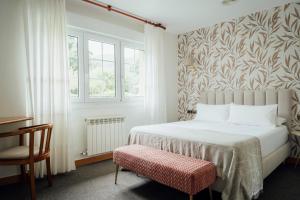 Postel nebo postele na pokoji v ubytování Hotel San Jorge