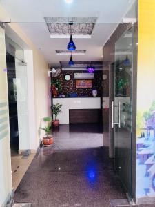an empty hallway with a bar in a building at Hotel Vistara Gomti Nager in Lucknow