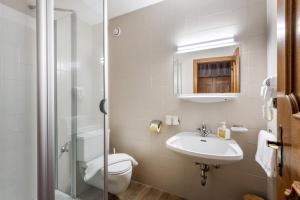 Koupelna v ubytování Gästehaus Berta + 33 fotografií