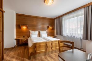 Postel nebo postele na pokoji v ubytování Gästehaus Berta