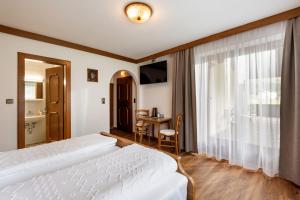 Postel nebo postele na pokoji v ubytování Gästehaus Berta