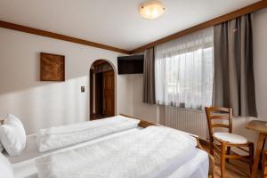 Postel nebo postele na pokoji v ubytování Gästehaus Berta