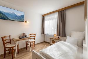 Postel nebo postele na pokoji v ubytování Gästehaus Berta