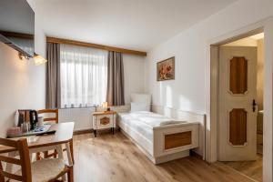 Postel nebo postele na pokoji v ubytování Gästehaus Berta