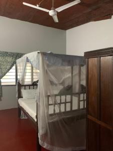 Postel nebo postele na pokoji v ubytování Peponi Watamu