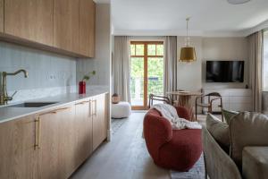 Μια τηλεόραση ή/και κέντρο ψυχαγωγίας στο Stara Przychodnia Apartamenty Premium