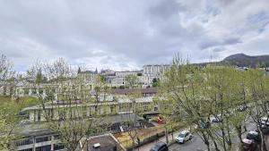 a view of a city with trees and buildings at Le Therme #Garage#Balcon - Meublé classé 3étoiles in Chamalières