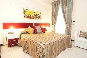 Katil atau katil-katil dalam bilik di B&B Vescovo Rosso