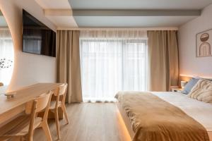 Ένα ή περισσότερα κρεβάτια σε δωμάτιο στο Iron Apartments +123 φωτογραφίες